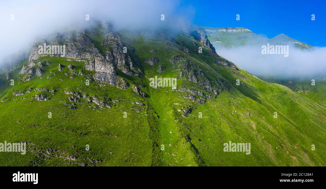 Spring landscape of mountains and meadows near the Portillo de Lunada in the Valle del Miera, Cantabria, Spain, Europe Stock Photo