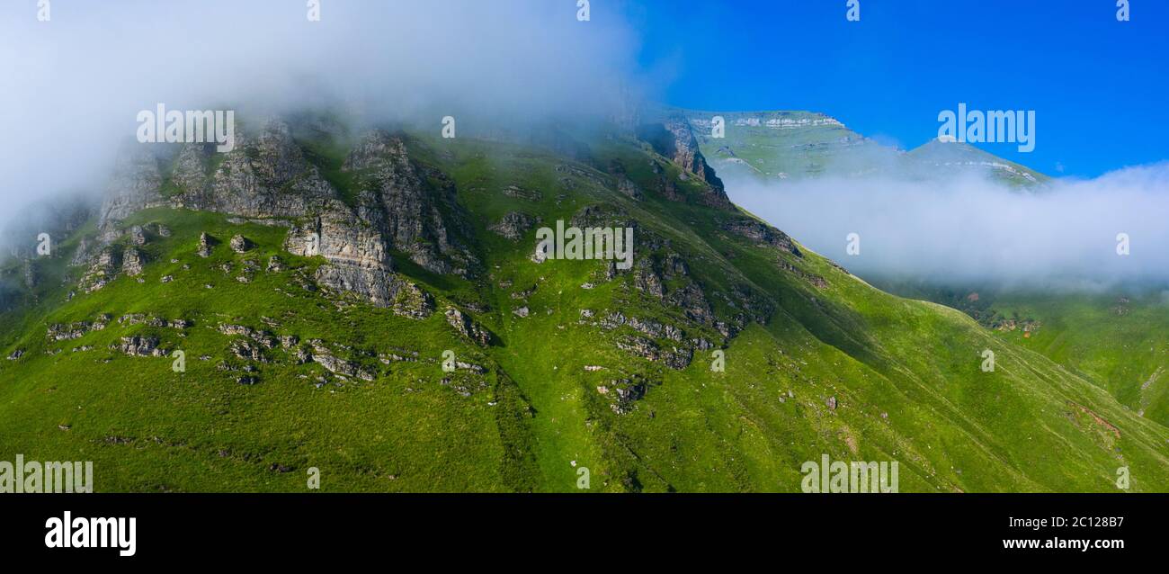 Spring landscape of mountains and meadows near the Portillo de Lunada in the Valle del Miera, Cantabria, Spain, Europe Stock Photo