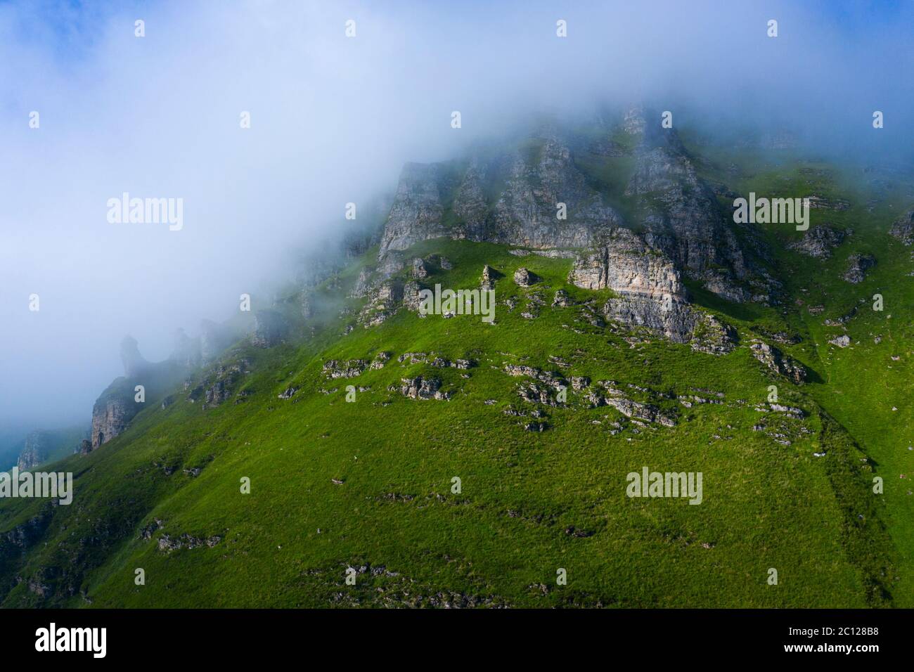 Spring landscape of mountains and meadows near the Portillo de Lunada in the Valle del Miera, Cantabria, Spain, Europe Stock Photo