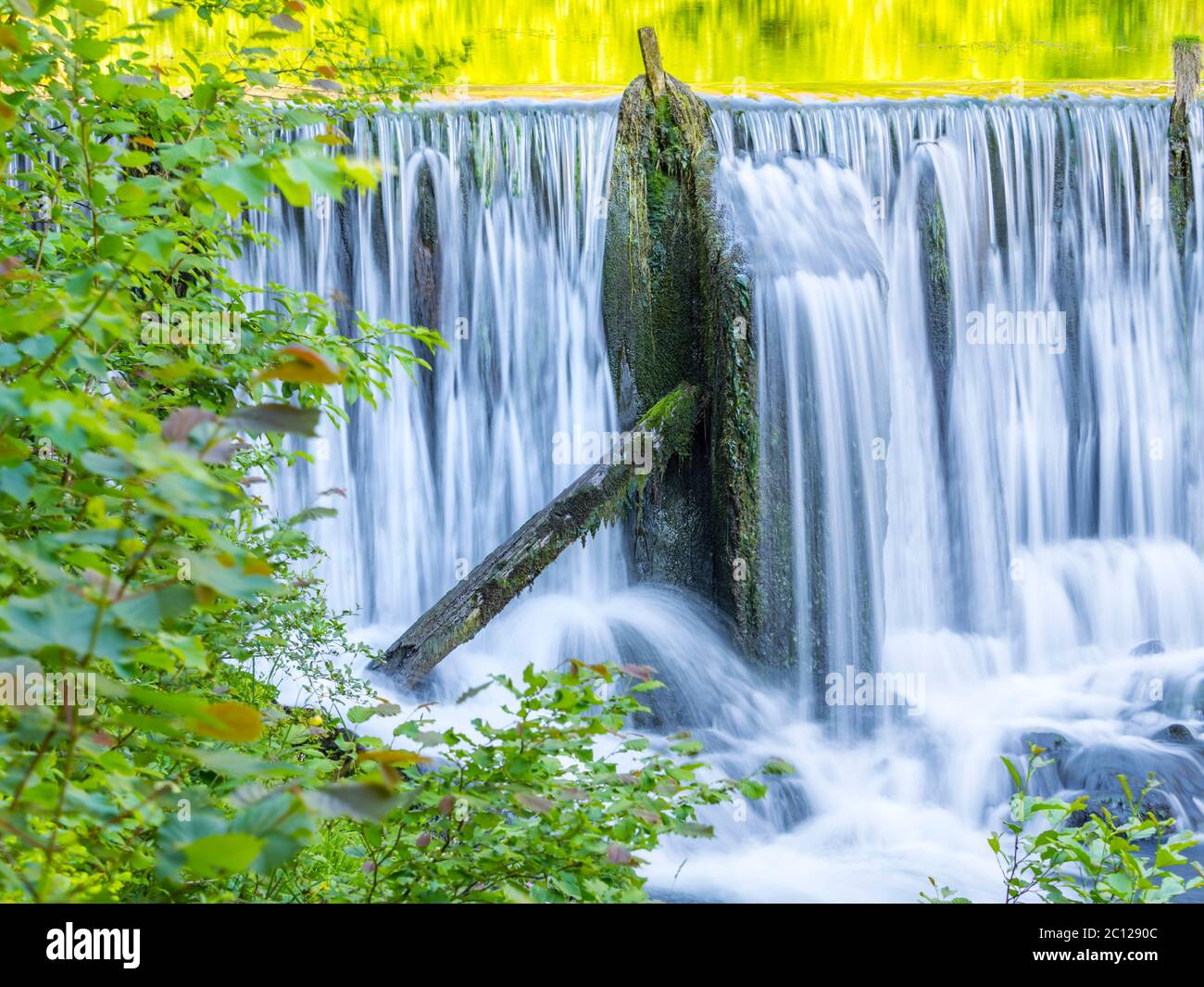 Lake with waterfall and derelict old sawmill and watermill Cogrljevo jezero Croatia Europe Stock Photo