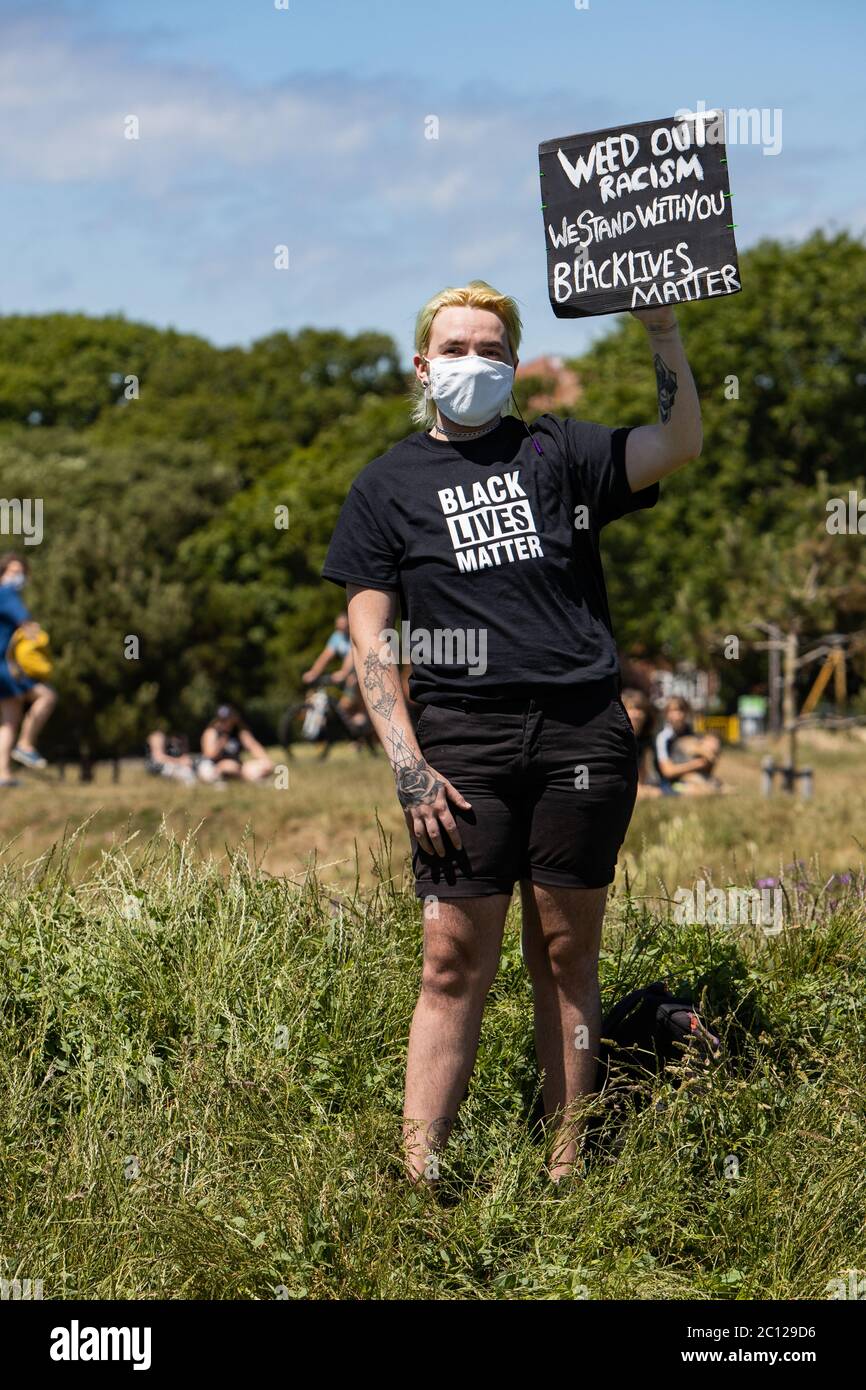 Eastbourne, East Sussex, UK – Saturday 13th June 2020 – Protesters gather in Princes Park  as part of the Black Lives Matter ( BLM )campaign. Stock Photo