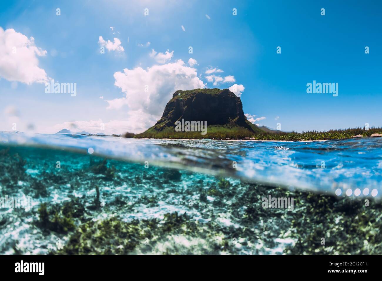 Tropical ocean with Le Morne mountain in Mauritius. Split view. Stock Photo
