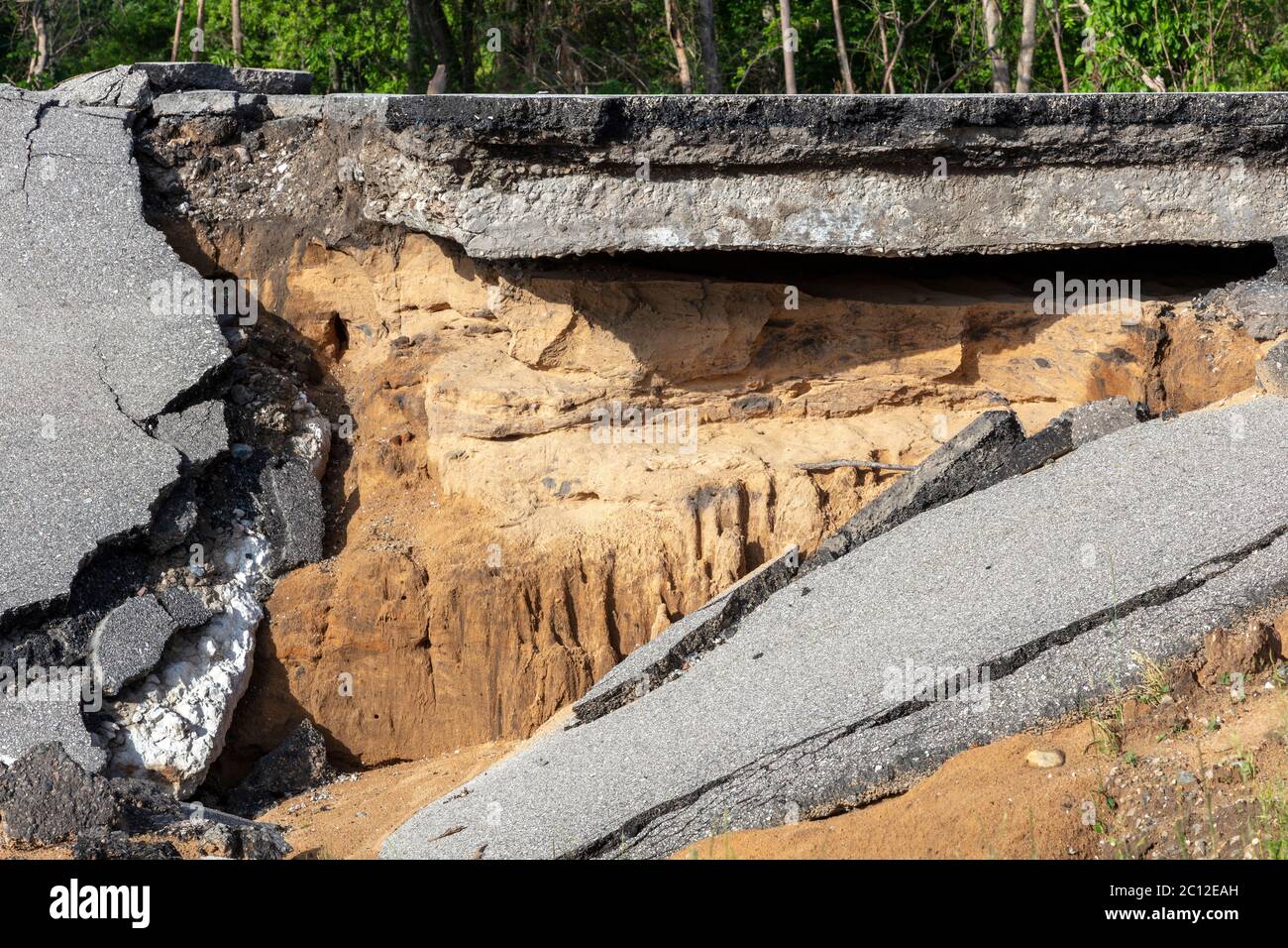 Earthen dam road near Sanford, MI USA. 6-11-2020, Original dam breech and flooding occurred 5-20-2020, by James D Coppinger/Dembinsky Photo Assoc Stock Photo