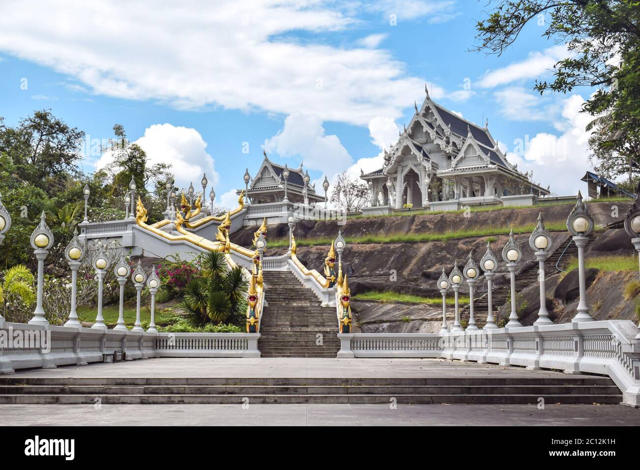 Staircase leading to beautiful white temple Wat Kaew Korawaram in Krabi Town Thailand Stock Photo