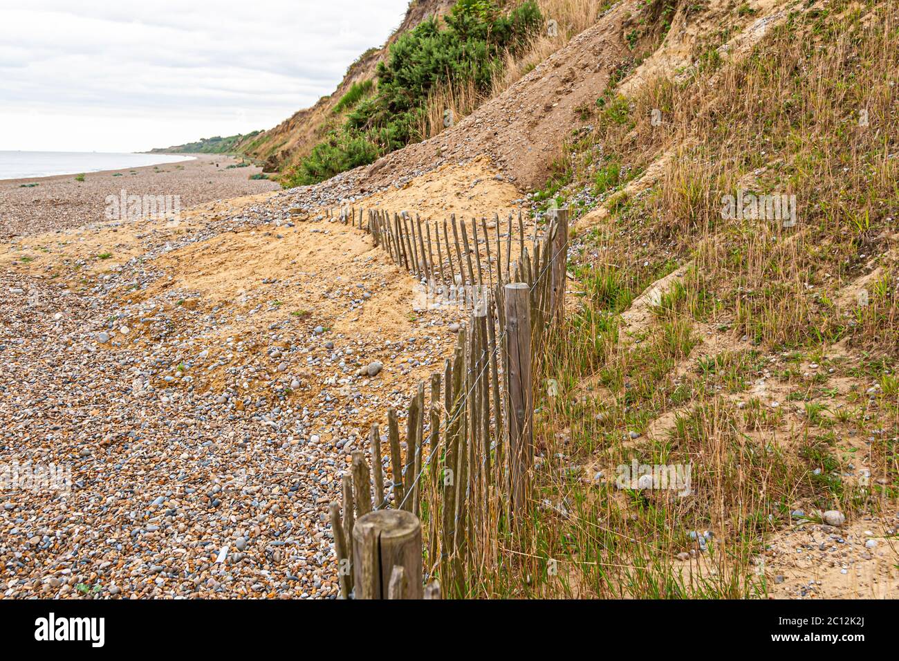 The beach near the village of Dunwich (England) continues to erode due to the sea current Stock Photo