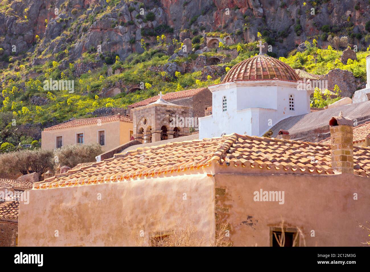 Monemvasia street view with old houses in ancient town, Peloponnese, Greece Stock Photo
