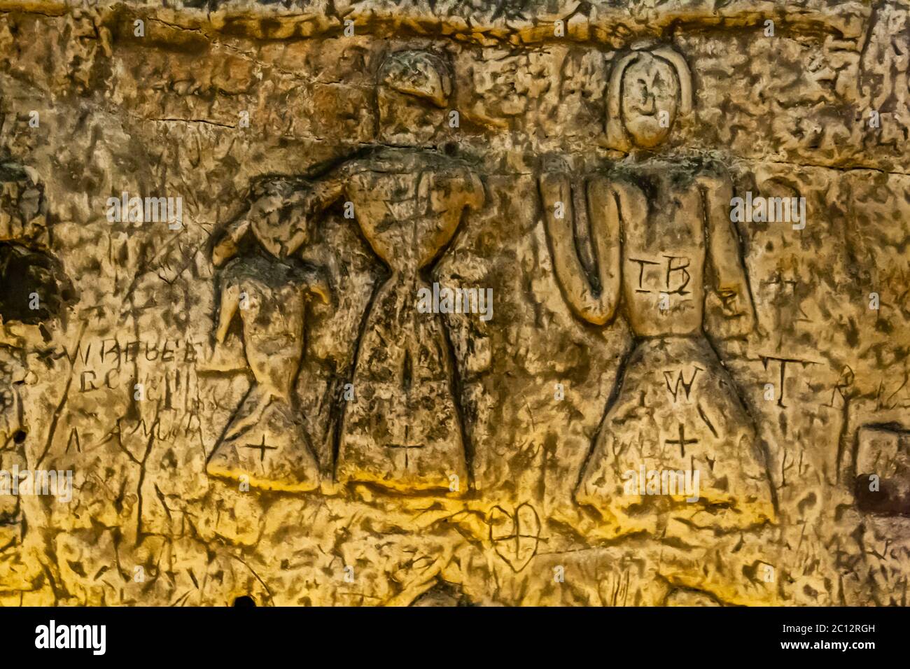 Recent research on the design of the crowns, swords, and costumes in Royston Cave suggests that the carvings were made around the mid-13th century. Royston Cave in Katherine's Yard, Melbourn Street, Royston, England Stock Photo