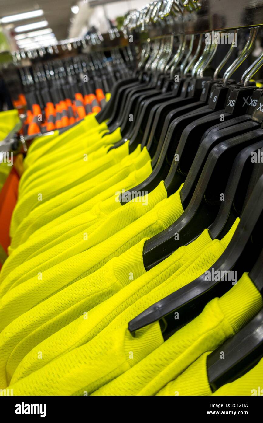 Neon colored industrial shirts and vests, USA Stock Photo