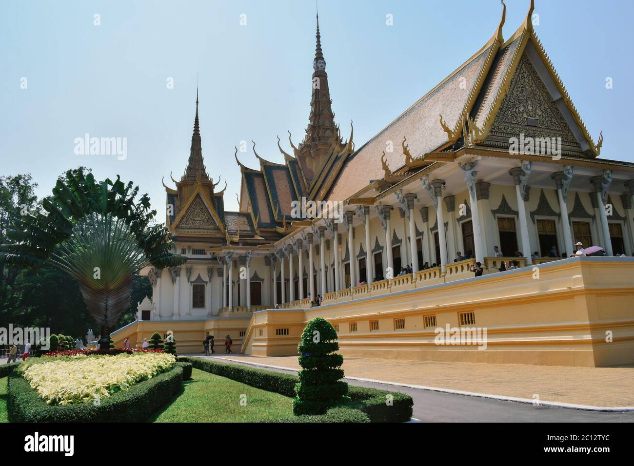 Touristy golden temple in the Phnom Penh Royal Palace in Cambodia Stock Photo