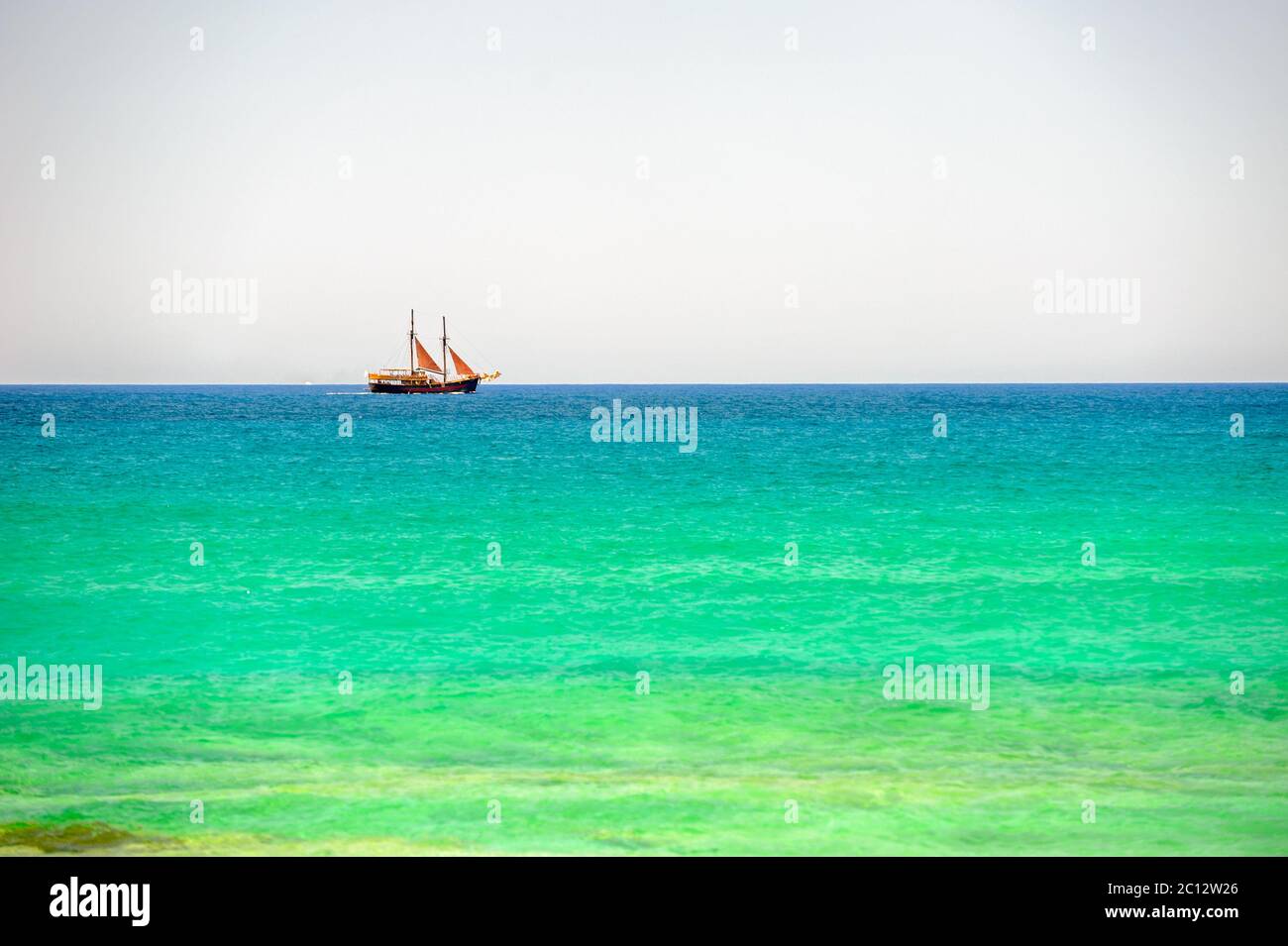 Sailing ship on sea horizon Stock Photo