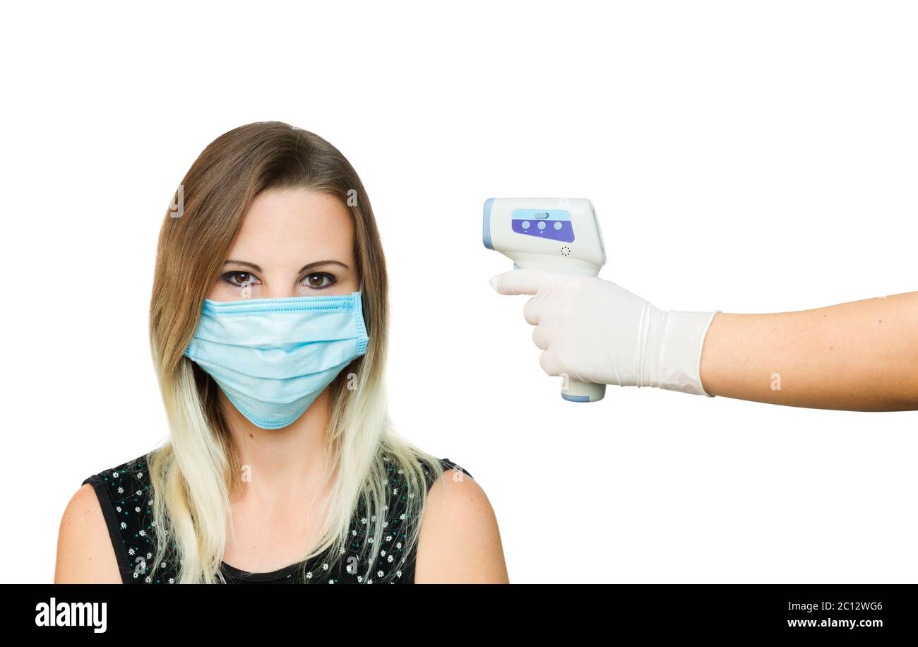 Usage of infrared non-contact forehead thermometer gun to check body ...