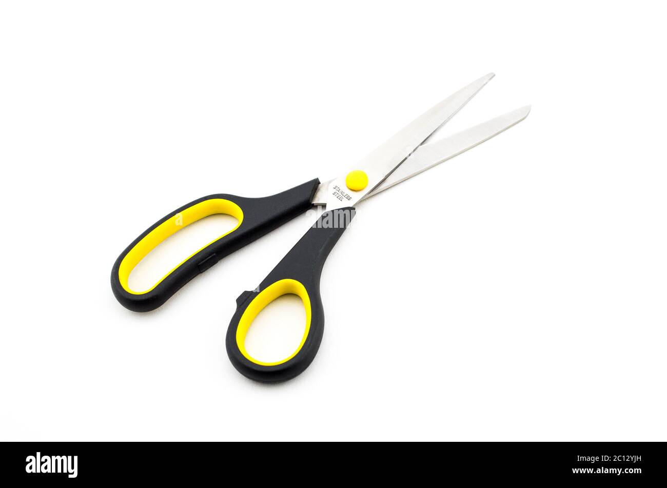 Black Scissors with yellow elements isolated on white background Stock Photo