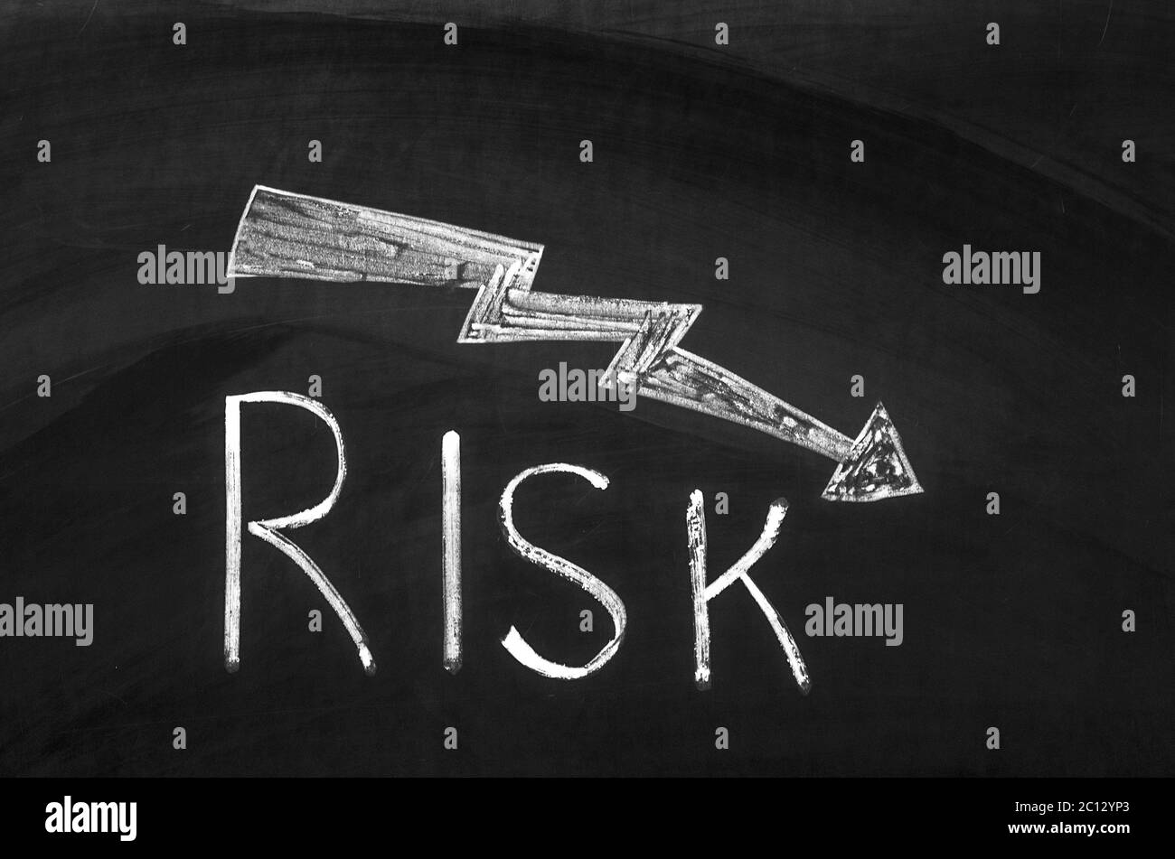 Optimistic risk graph drawn on the blackboard. Stock Photo