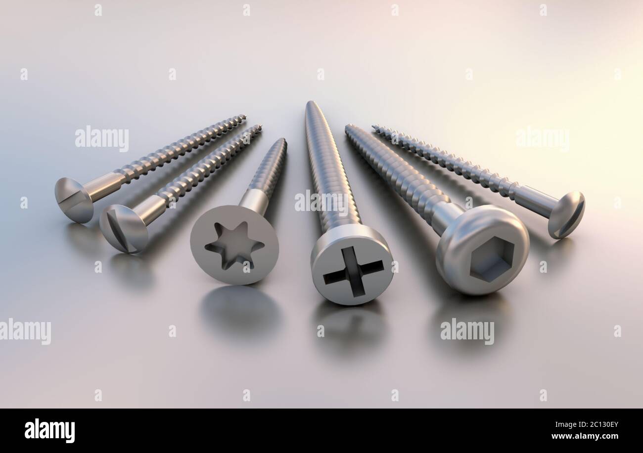 Six different metal screws next to each other on reflective underground Stock Photo