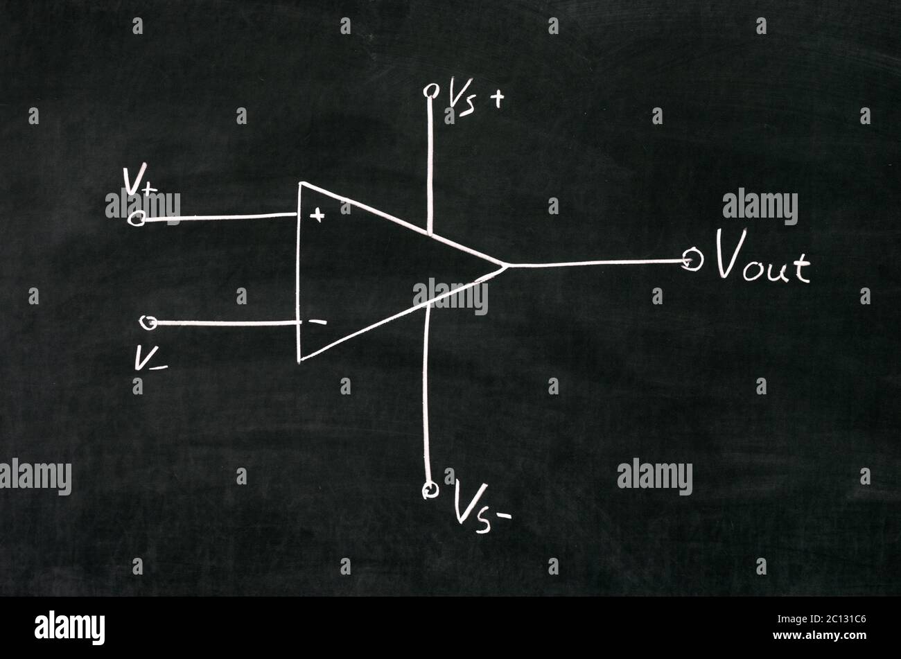 Operational amplifier circuit drawn on the blackboard with chalk Stock Photo