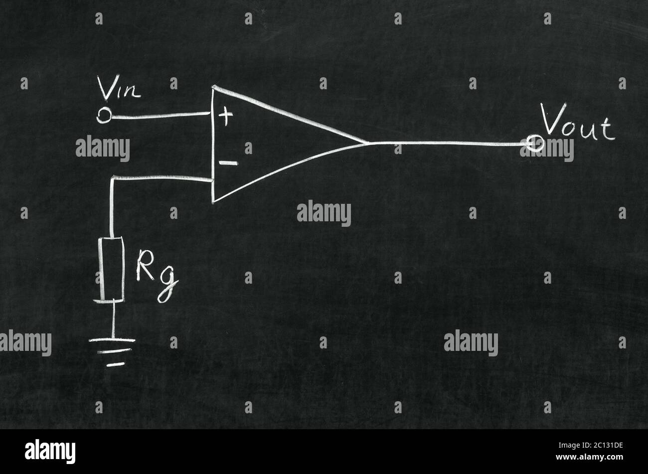 Operational amplifier circuit drawn on the blackboard with chalk Stock Photo