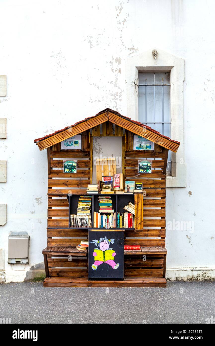 Book exchange box on the street in Saint-Espirit, Bayonne, France Stock Photo