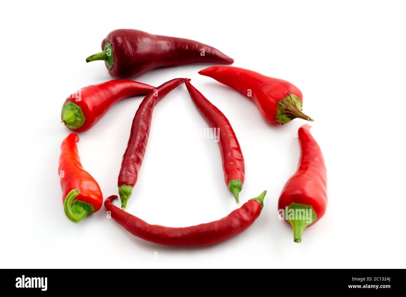 Red hot chili peppers isolated on white background Stock Photo - Alamy