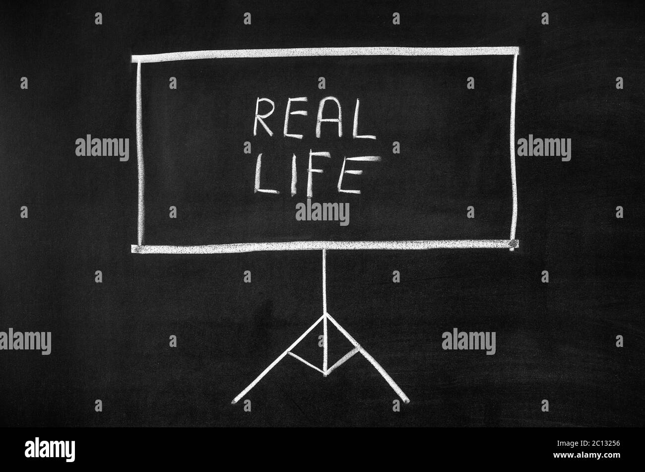 Projector screen drawn on the blackboard. The display shows text. Stock Photo