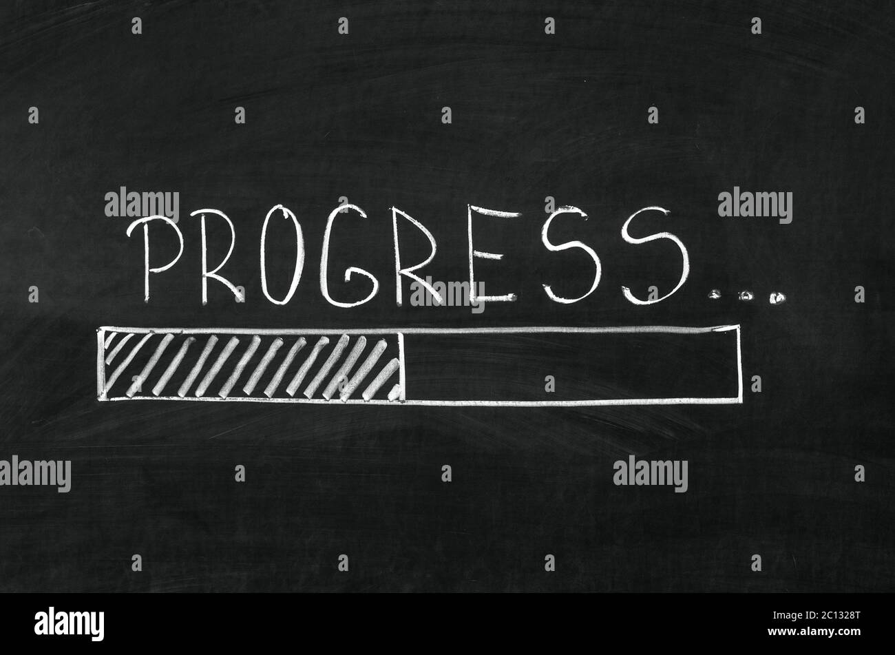 Progress handwritten with white chalk on a blackboard and drawing download bar Stock Photo