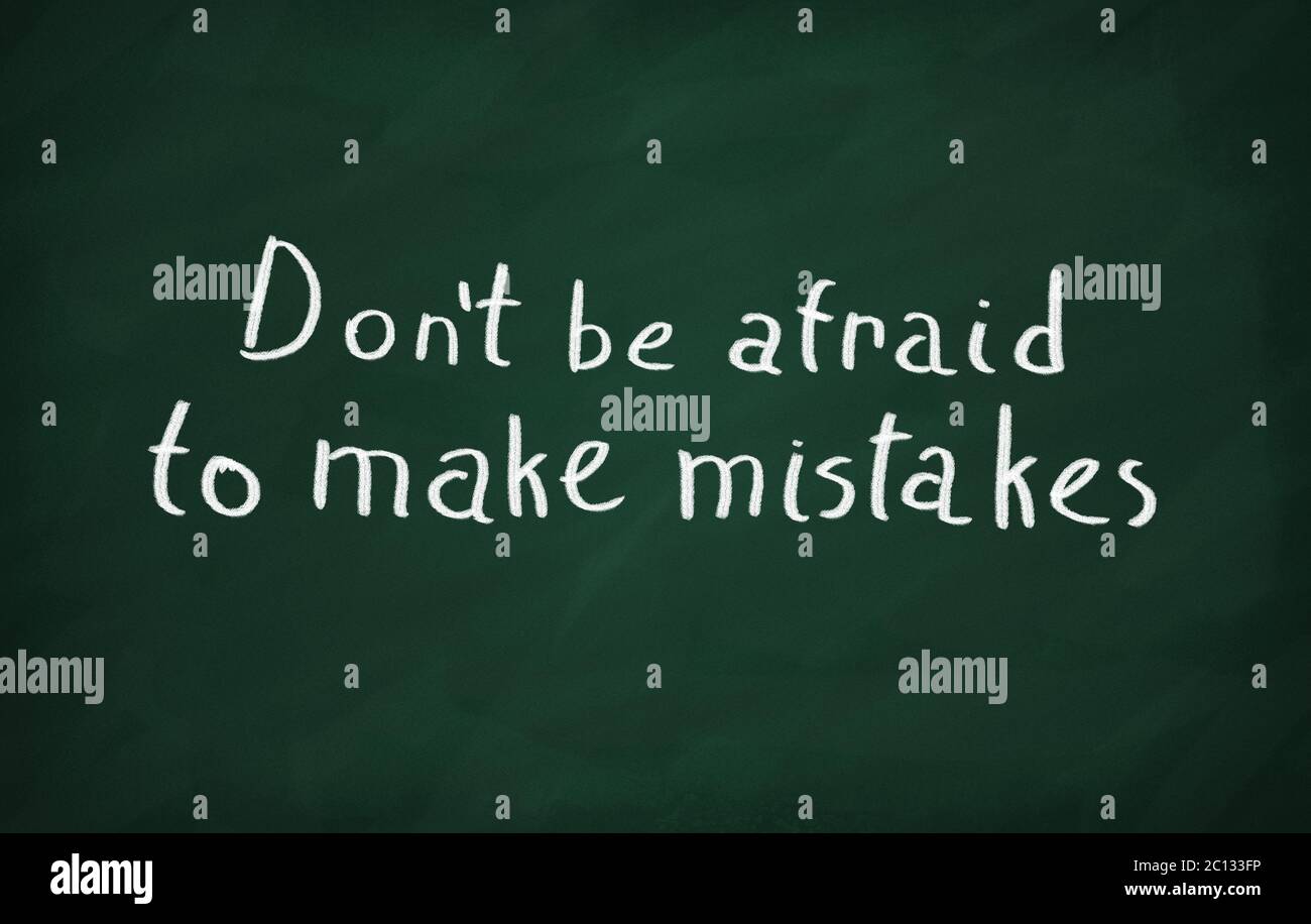 On the blackboard write Don't be afraid to make mistakes Stock Photo