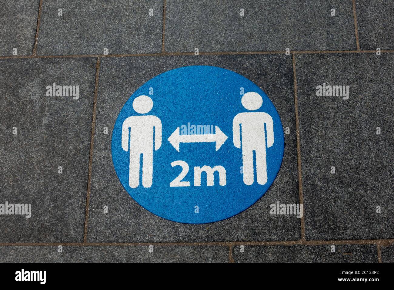 2 meters illustration on a sidewalk in the UK Stock Photo