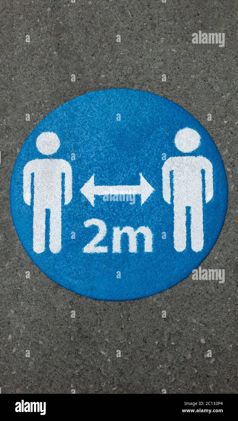 2 meters illustration on a UK sidewalk Stock Photo