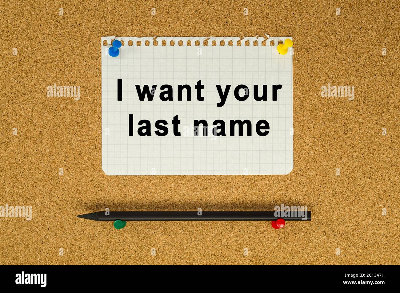 I want your last name text note message pin on bulletin board Stock Photo