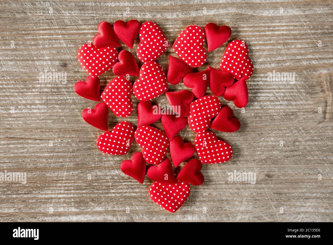 Heart shape formed with small hearts Stock Photo - Alamy