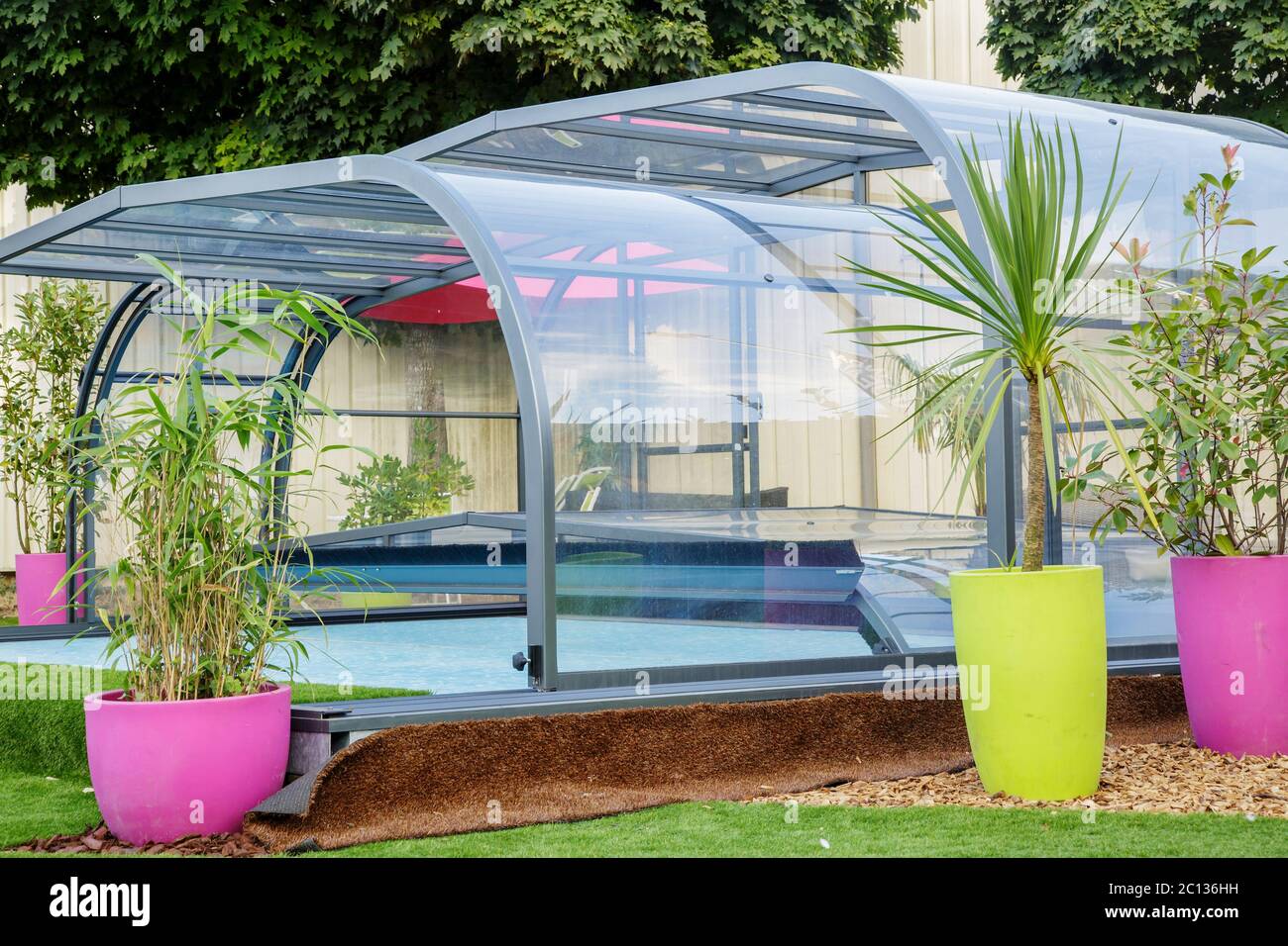 La rochelle, France - Aug 30, 2016: automatic retractable pool enclosure system to protect pool Stock Photo