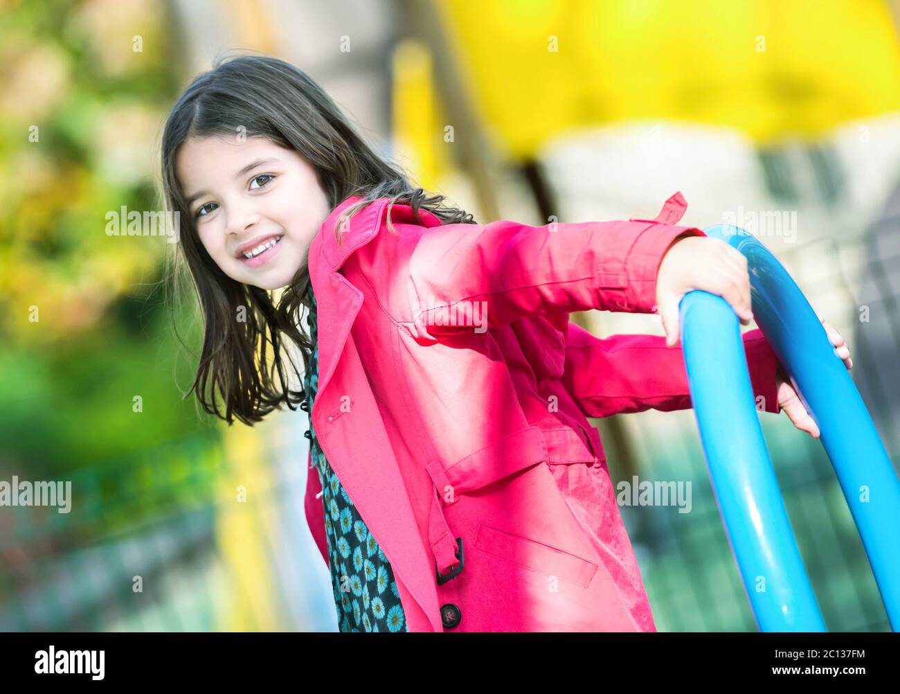happy cute little girl in playground Stock Photo - Alamy