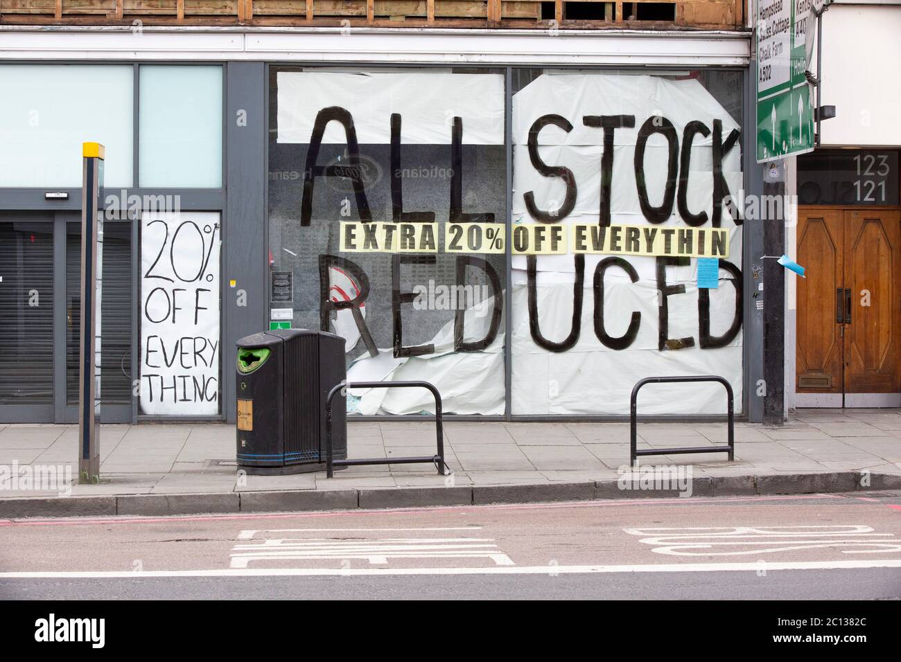 Closed and sad-looking shop windows in Camden High Street. Stock Photo