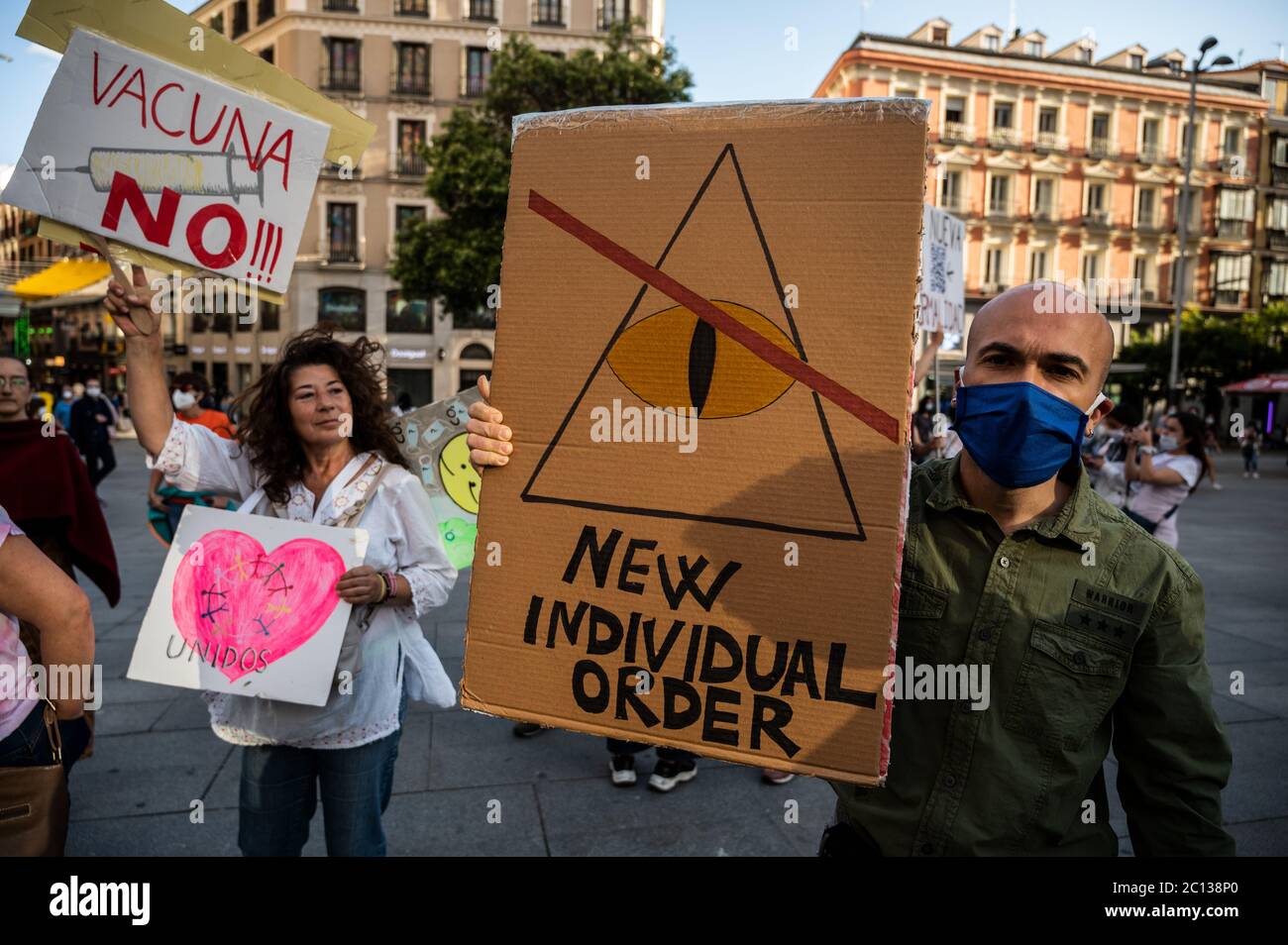 Madrid, Spain. 13th June, 2020. Madrid, Spain. June 13, 2020. People protesting with placards against new normality and New World Order conspiracy theory during the coronavirus (COVID-19) crisis. Credit: Marcos del Mazo/Alamy Live News Stock Photo