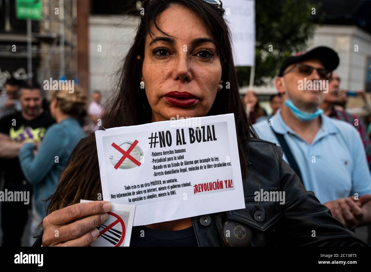 Madrid, Spain. 13th June, 2020. Madrid, Spain. June 13, 2020. A woman protesting against new normality and New World Order conspiracy theory during the coronavirus (COVID-19) crisis. Credit: Marcos del Mazo/Alamy Live News Stock Photo