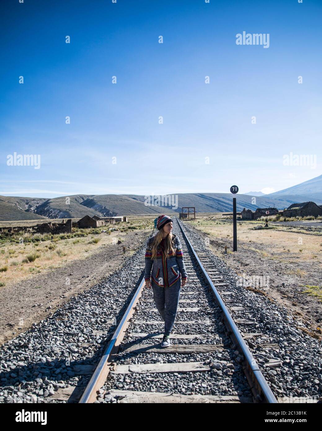 young woman in the railroad, modeling and blue sky Stock Photo