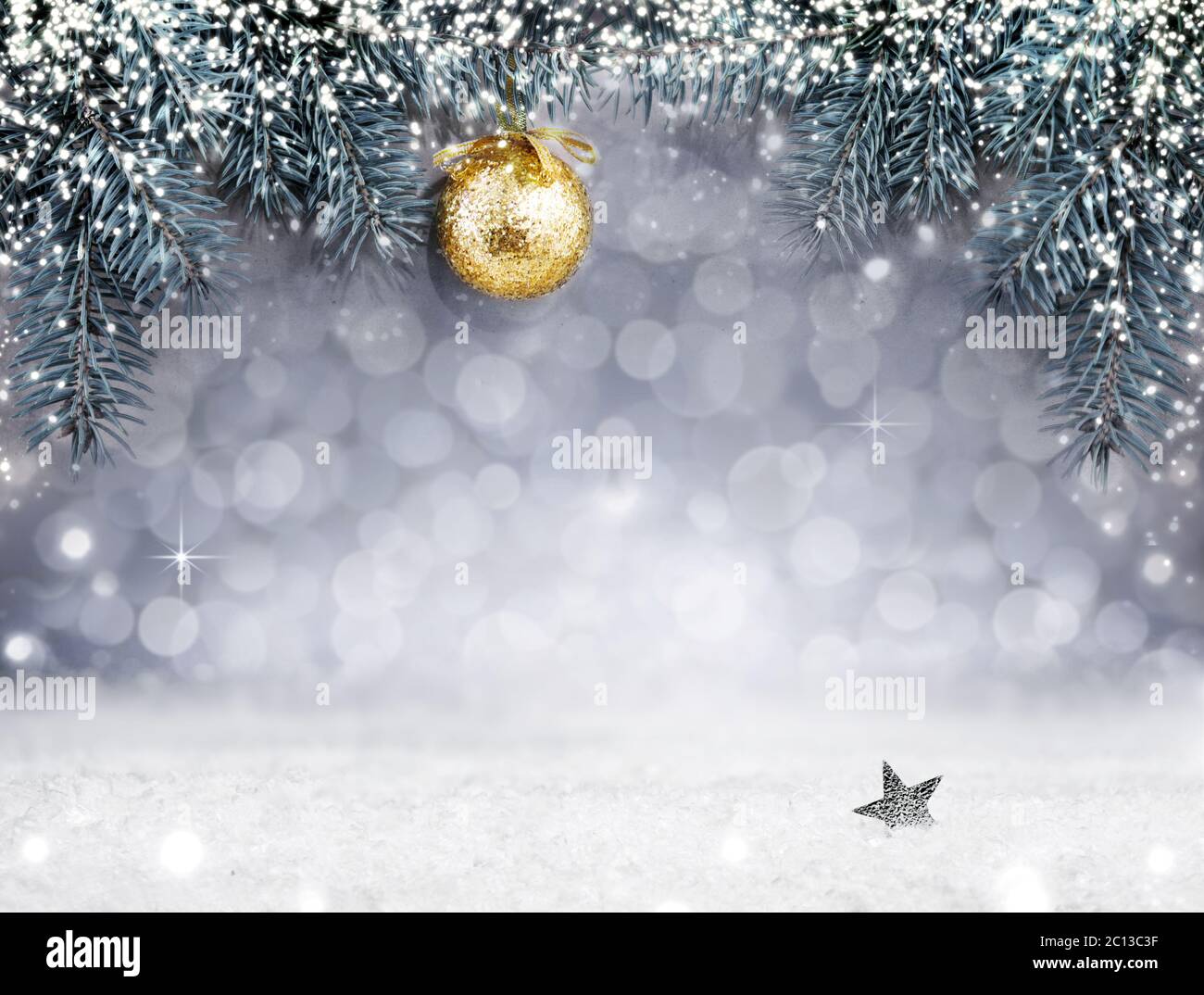 Christmas background with snow and golden ball on spruce branch Stock ...