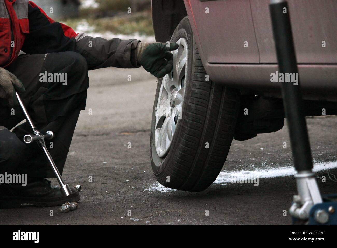 installation of passenger car wheel and replacement on winter tire