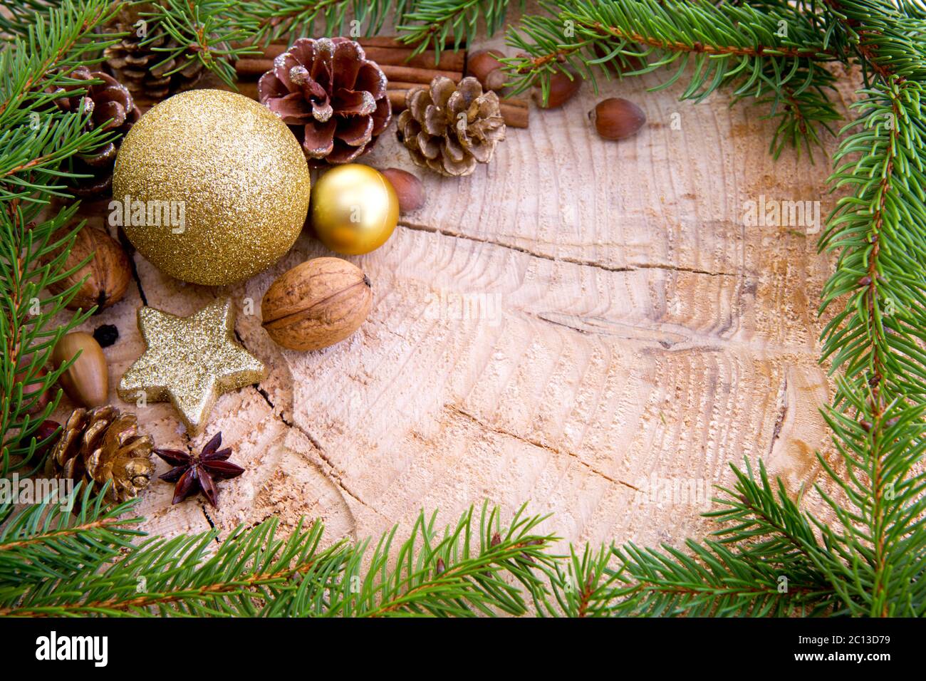 Christmas frame decorated with golden bauble and fir branches Stock ...