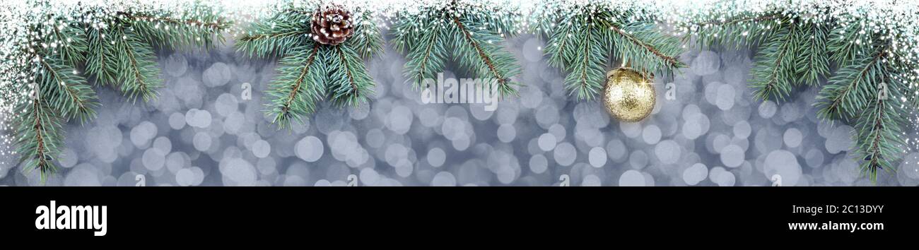 Christmas background with golden ball and fir tree branches Stock Photo ...