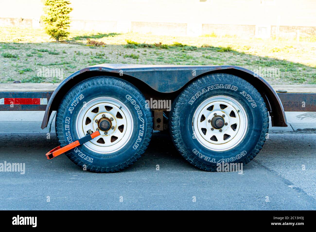 June 30 2019 Calgary , Alberta Canada Clamped wheels on a trailer
