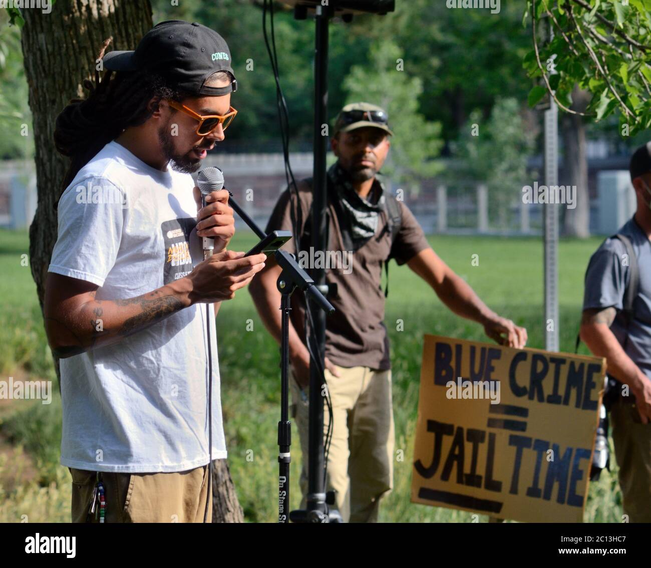 Speaking the names of African Americans killed by police in the United States before a Black Lives Matter demonstration in Boulder, CO, June 12, 2020. Stock Photo