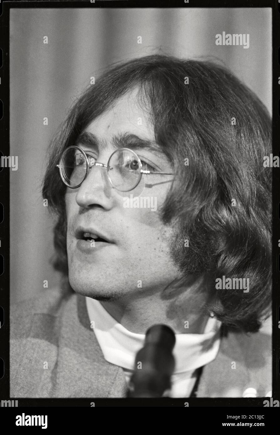 John and Paul at a press conference on May 14th 1968, 1:30pm at New York's Americana Hotel. Here John and Paul described their vision and their hopes for their new Apple Corp. Image from 35mm negative. Stock Photo