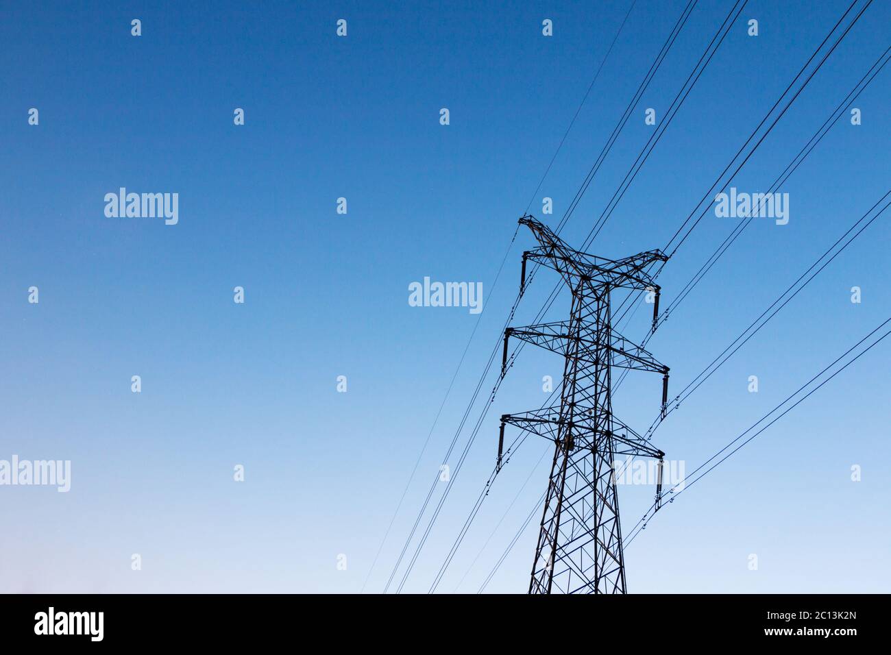 Pylon in field blue sky hi-res stock photography and images - Alamy