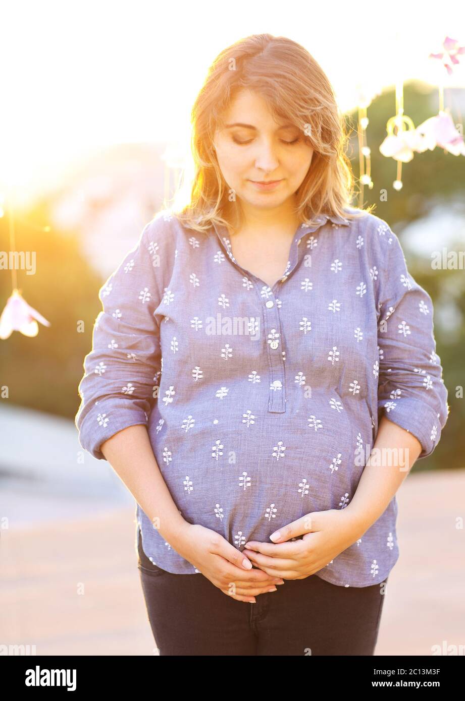 Pregnant tummy standing street hi-res stock photography and images - Alamy