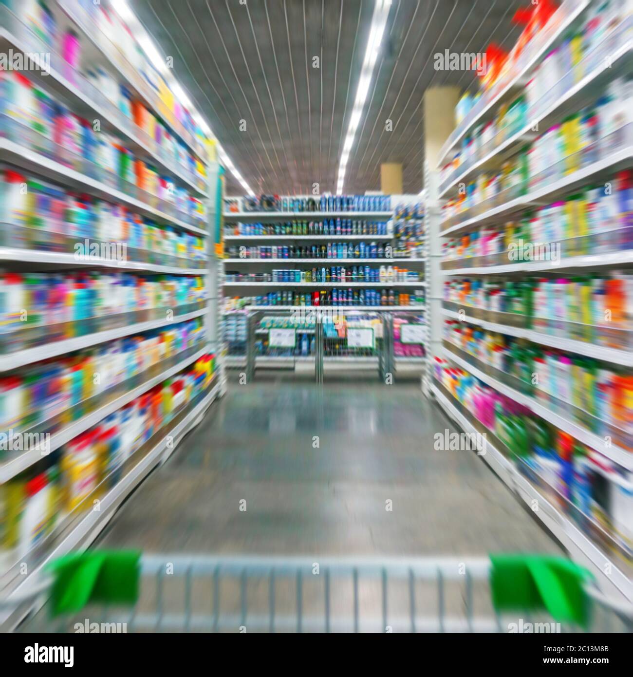 Shopping Cart View on a Supermarket Aisle and Shelves Image Has a Shallow Depth of Field Stock