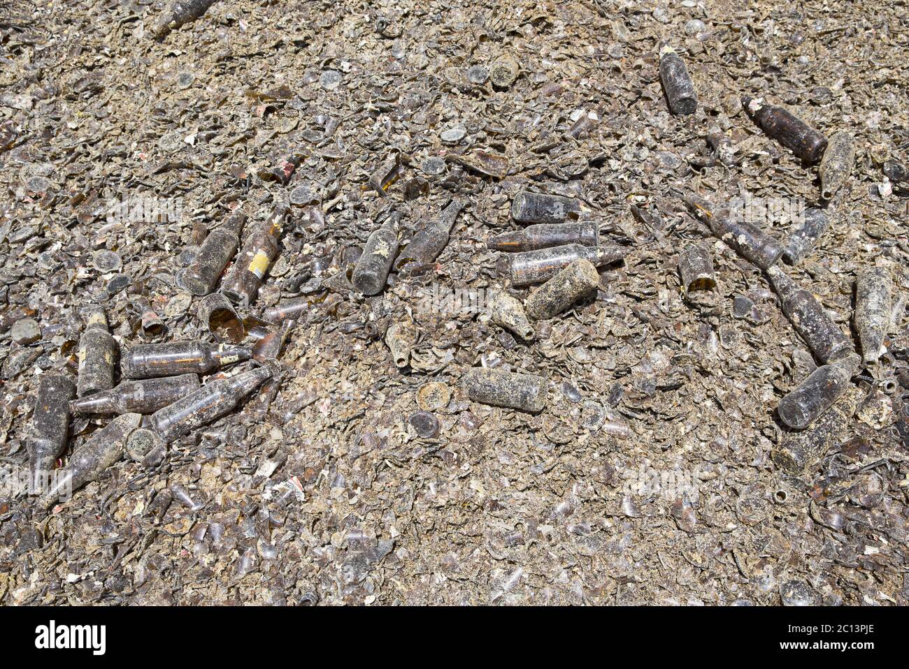 Glass waste in recycling facility. Brown bottles Stock Photo Alamy