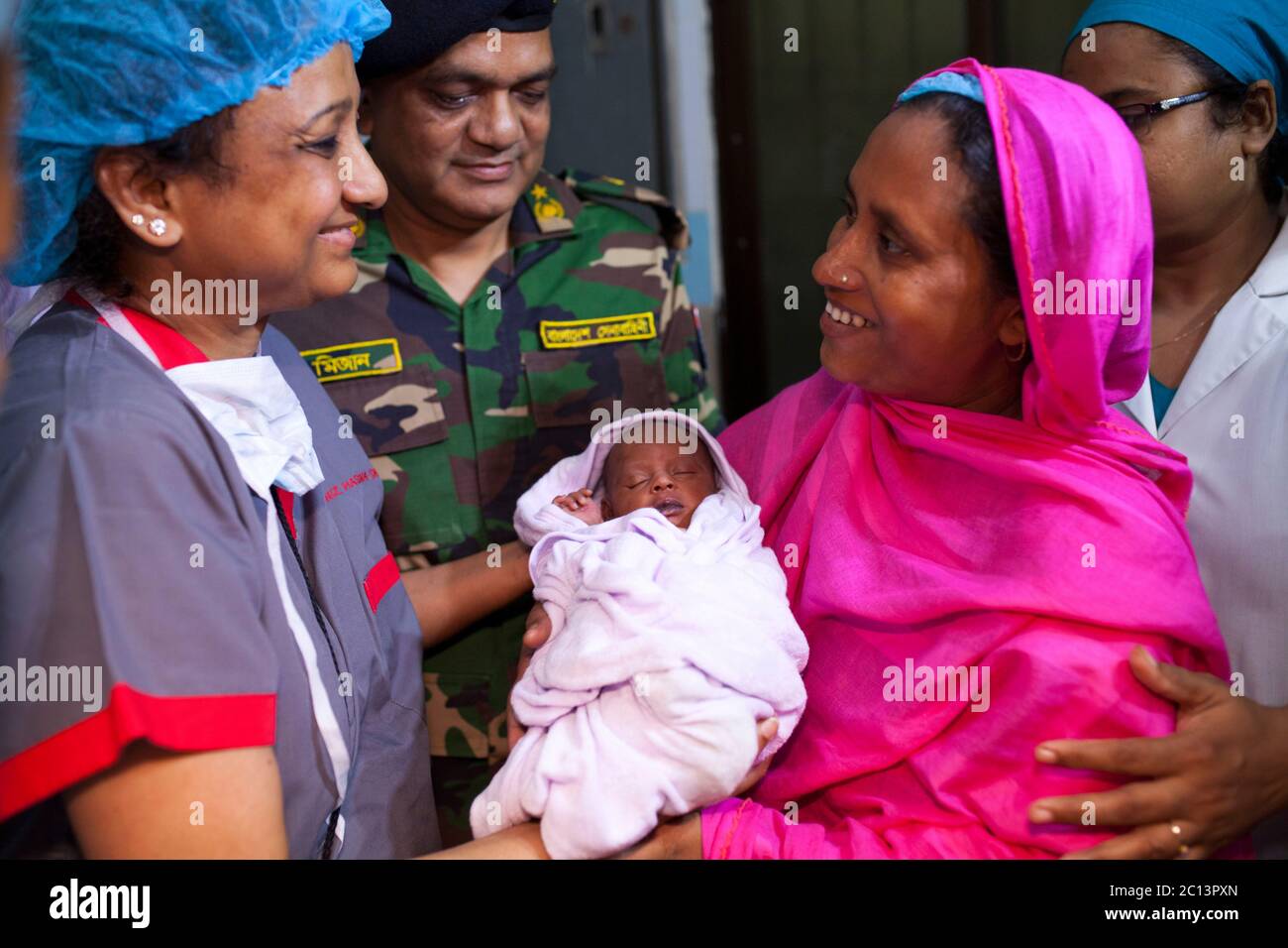 DHAKA, BANGLADESH 16th August : Suraiya infant who was took bullet in mother’s womb shifted to her mother at Dhaka Medical College Hospital, Banglades Stock Photo