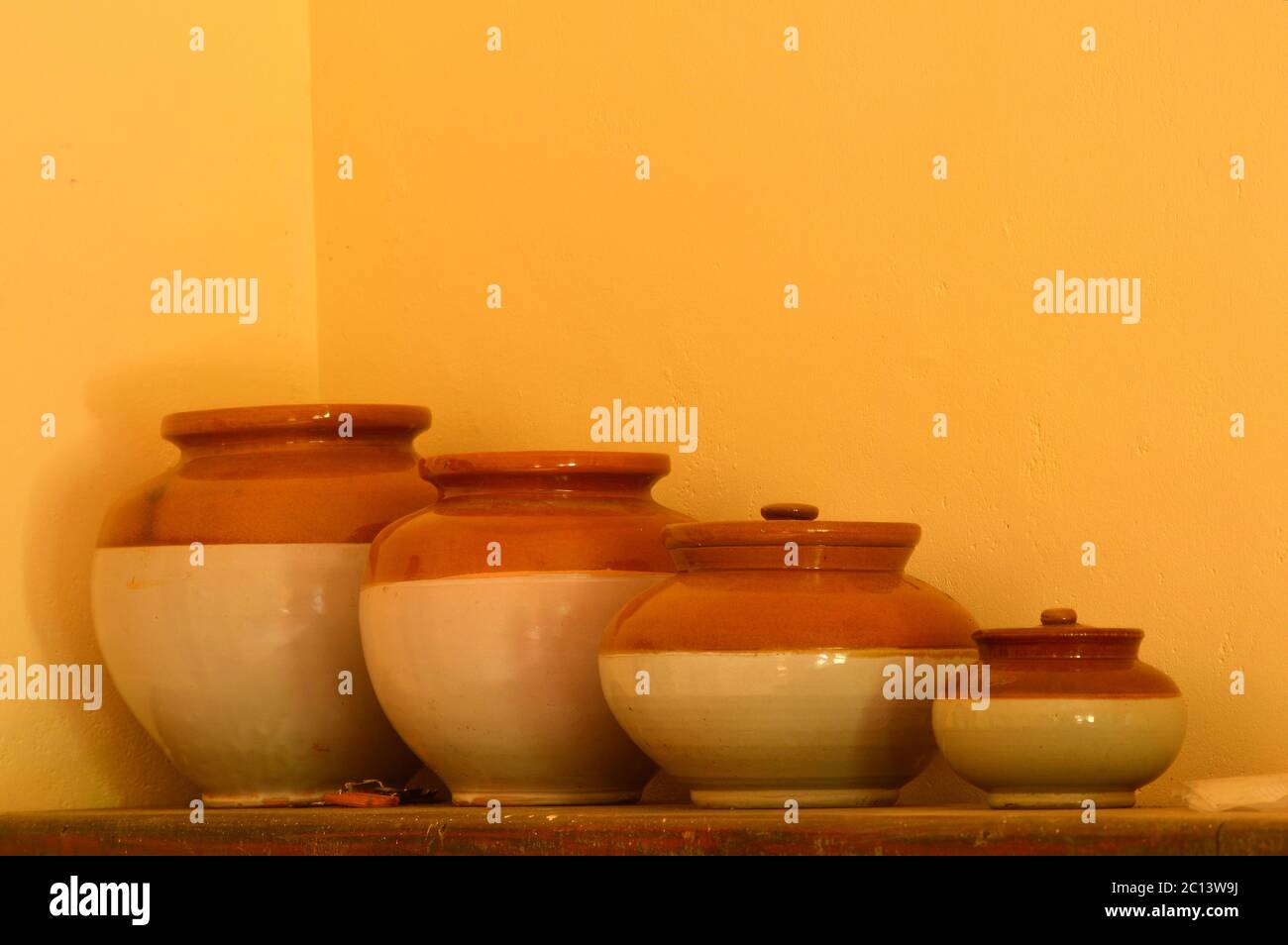 ceramic jars used for storing pickles in focus forming a beautiful