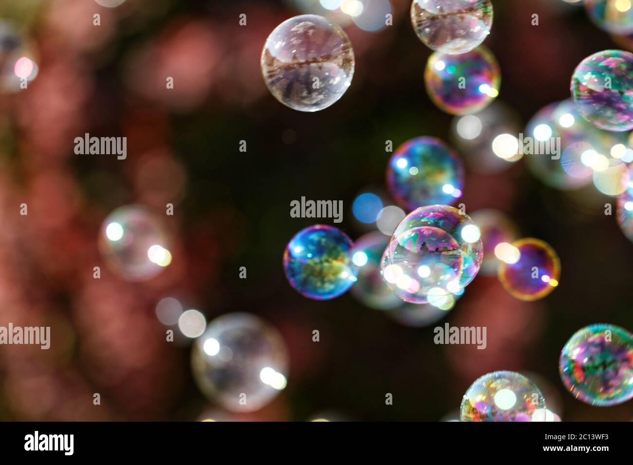 The rainbow bubbles from the bubble blower Stock Photo