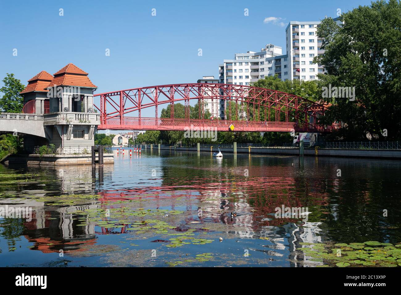 13.06.2019, Berlin, Germany, Europe - The Tegeler Hafenbruecke Bridge (Sechserbruecke) connects both banks at the Tegel canal and Tegel port. Stock Photo